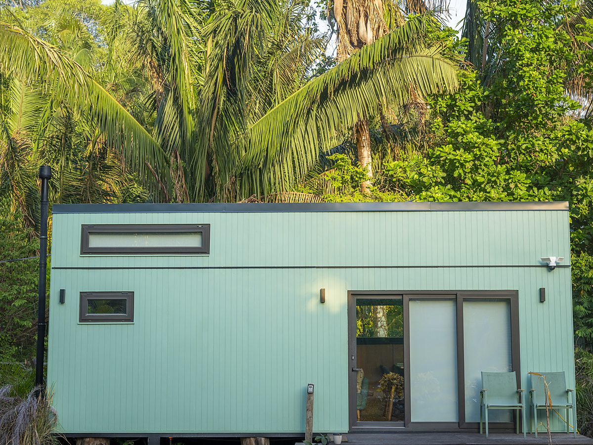 Atenea — mint green eco tiny home nestled in the Nosara jungle