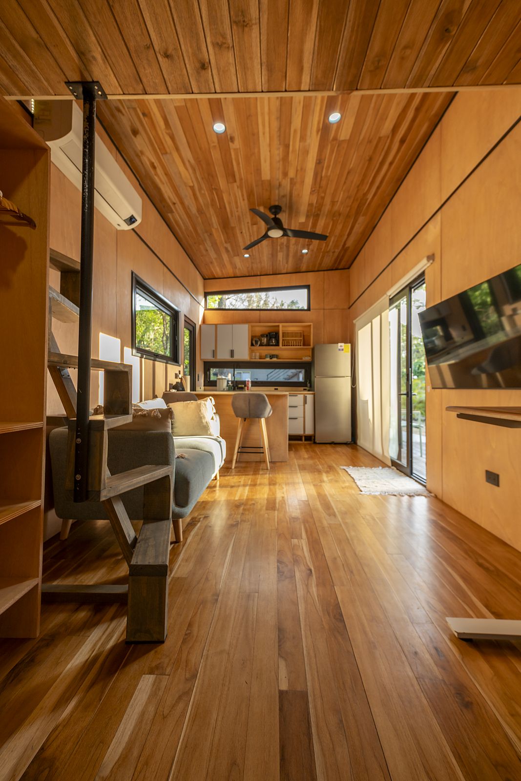 Atenea interior — wood-lined living space